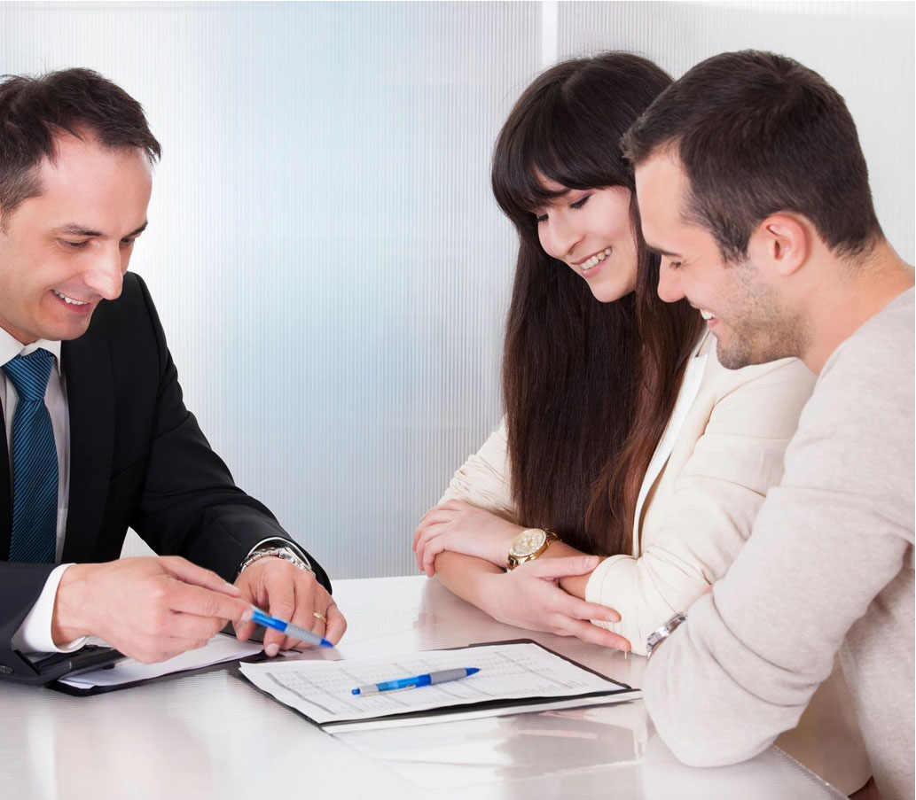 A couple of people sitting at a table